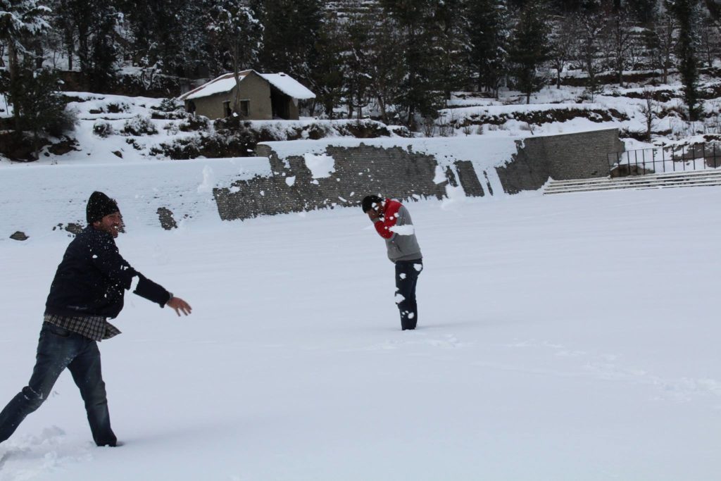Snowballing in Kalpa football ground of Kinnaur
