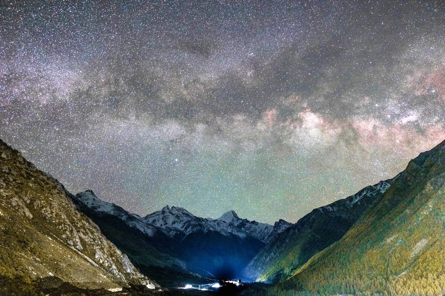 Starry night sky and milky way over Chitkul village