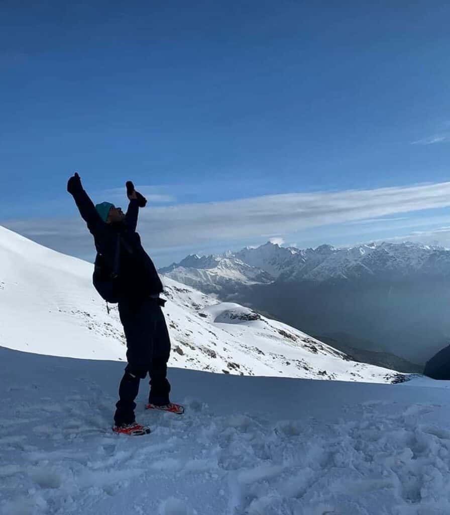 A hiker standing on Buran Ghati pass