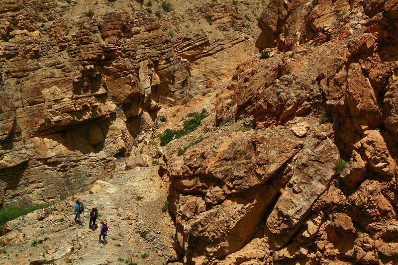 Hikers climbing up the gorge on the way to Dumla camp site