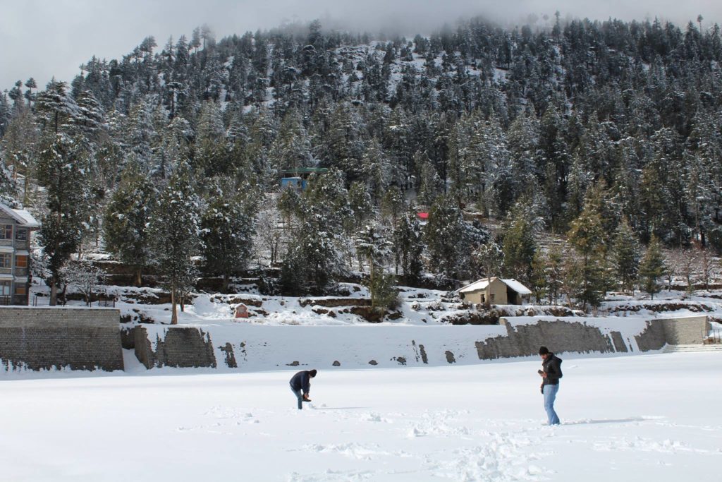 Strolling in Kalpa football ground during winters