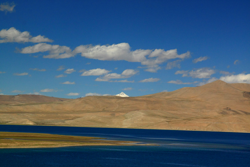 Blue waters of Tso Moriri Lake enclosed by mountains